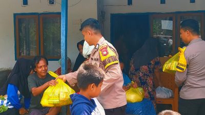 Sambut HUT Bhayangkara ke-79, Polres Pohuwato Salurkan Bantuan Sosial untuk Warga Terdampak Banjir di Taluditi