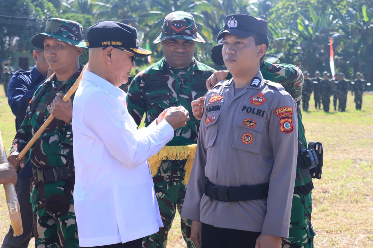 TMMD Ke-129 Tahun Anggaran 2026 diresmikan lewat upacara di Desa Mekarti Jaya, Taluditi, Rabu (15/7/2026), dipimpin Bupati Saipul A. Mbuinga.