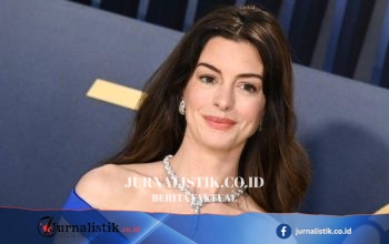 Anne Hathaway Santai Hadapi Teori “Fake Baby Bump” dan Tulis: “Fake Hair, Real Bump”