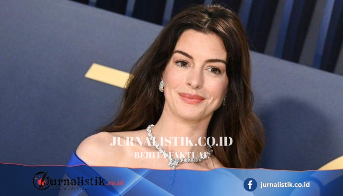 Anne Hathaway Santai Hadapi Teori “Fake Baby Bump” dan Tulis: “Fake Hair, Real Bump”