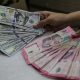 Rupiah Mengakhiri Perdagangan Melemah ke Rp18.027 per Dolar AS, Disorot Ketegangan Timur Tengah dan Data Ekonomi