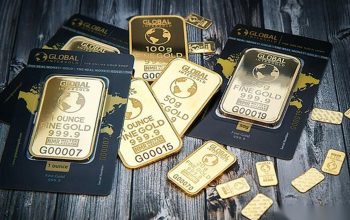 Emas dan Perak Terkoreksi, Tekanan Dolar AS serta Kenaikan Minyak Membayangi